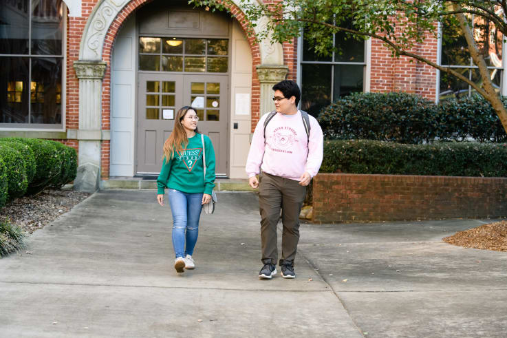 Clemson students walk outside Hardin Hall.