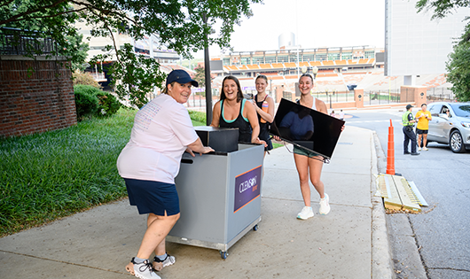 Clemson University students moving on Campus